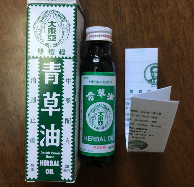 新加坡双虾标青草油图片